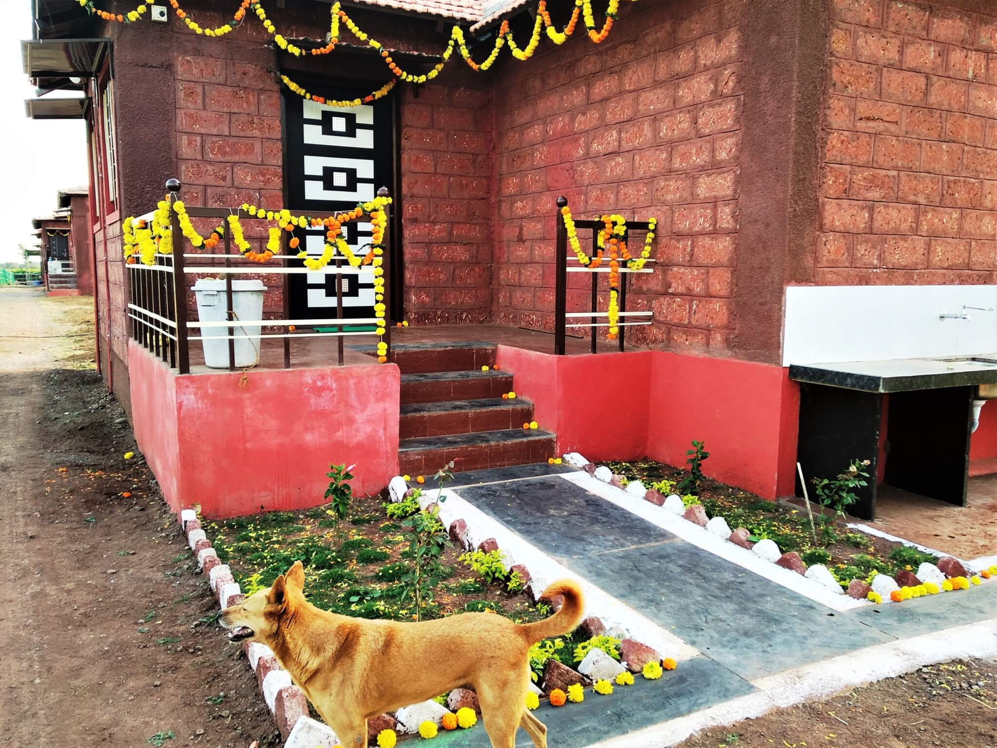 The sanctuary's office building is decked out with flowers and garlands.